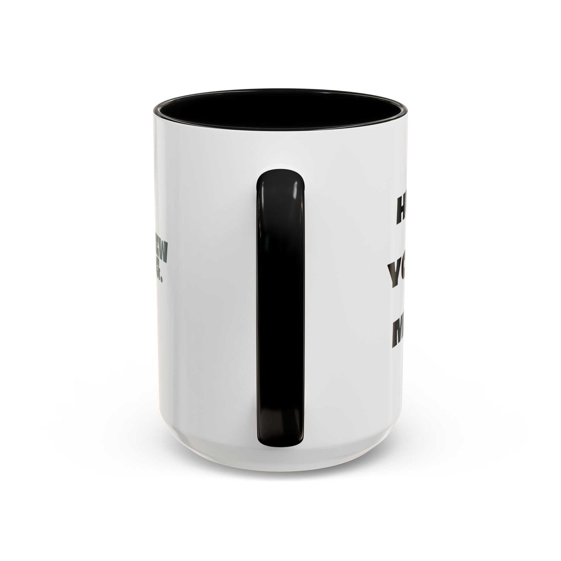 White mug with black interior and handle on a white background
