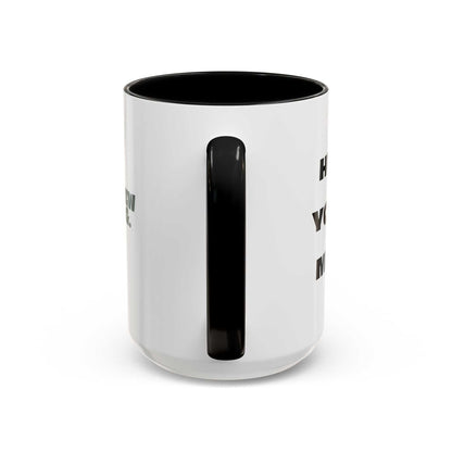 White mug with black interior and handle on a white background