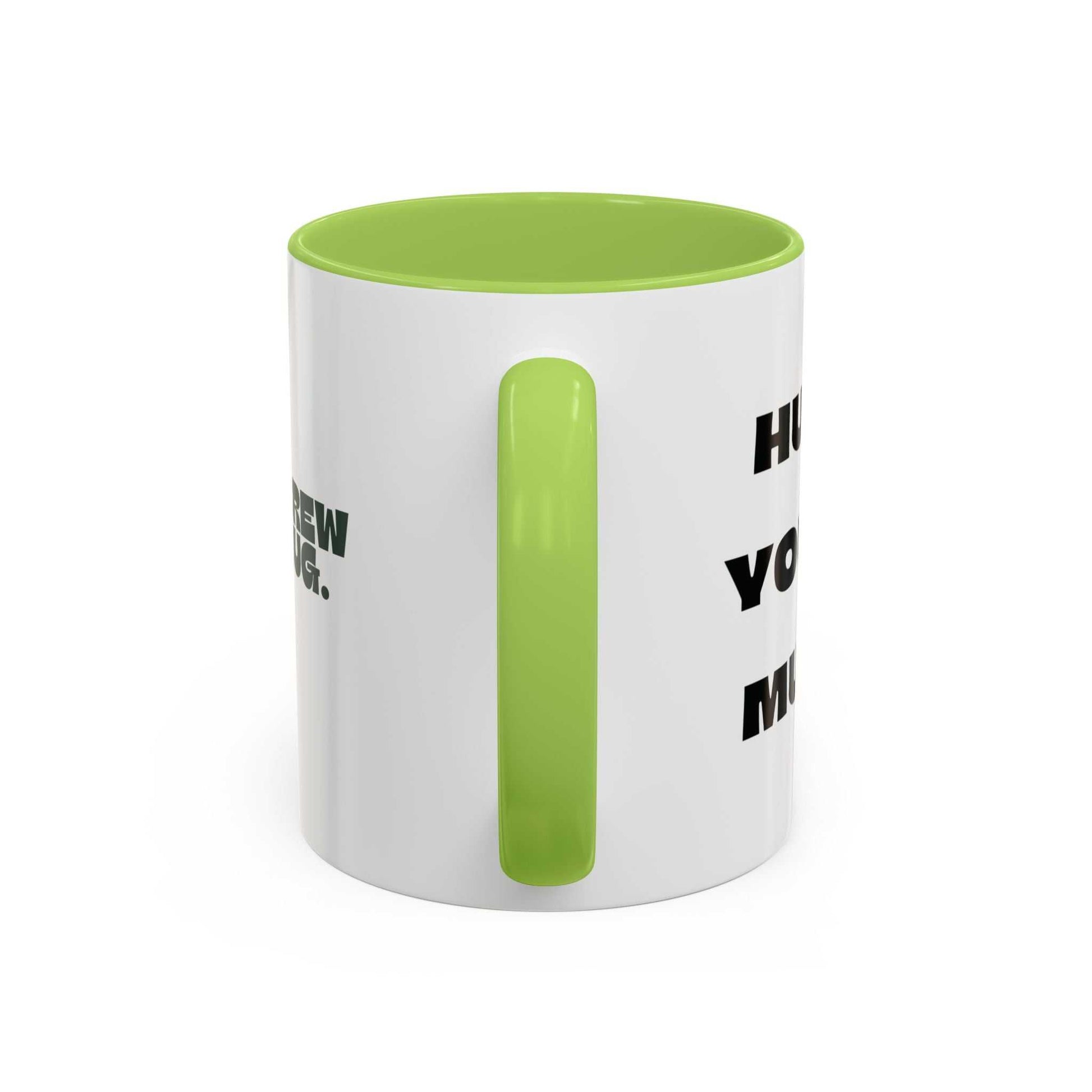White mug with green interior and handle, featuring text on a white background