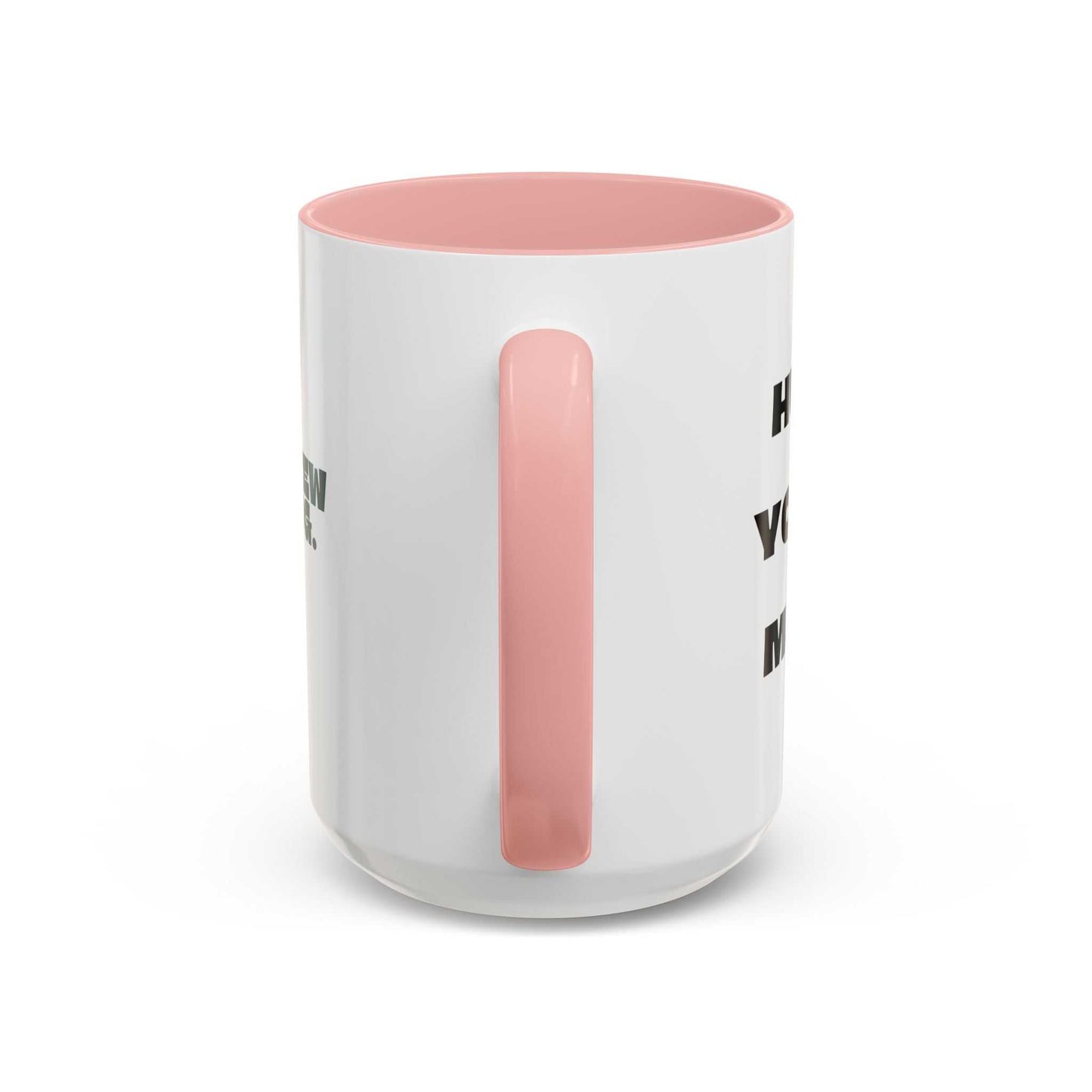 White mug with pink interior and handle on a white background
