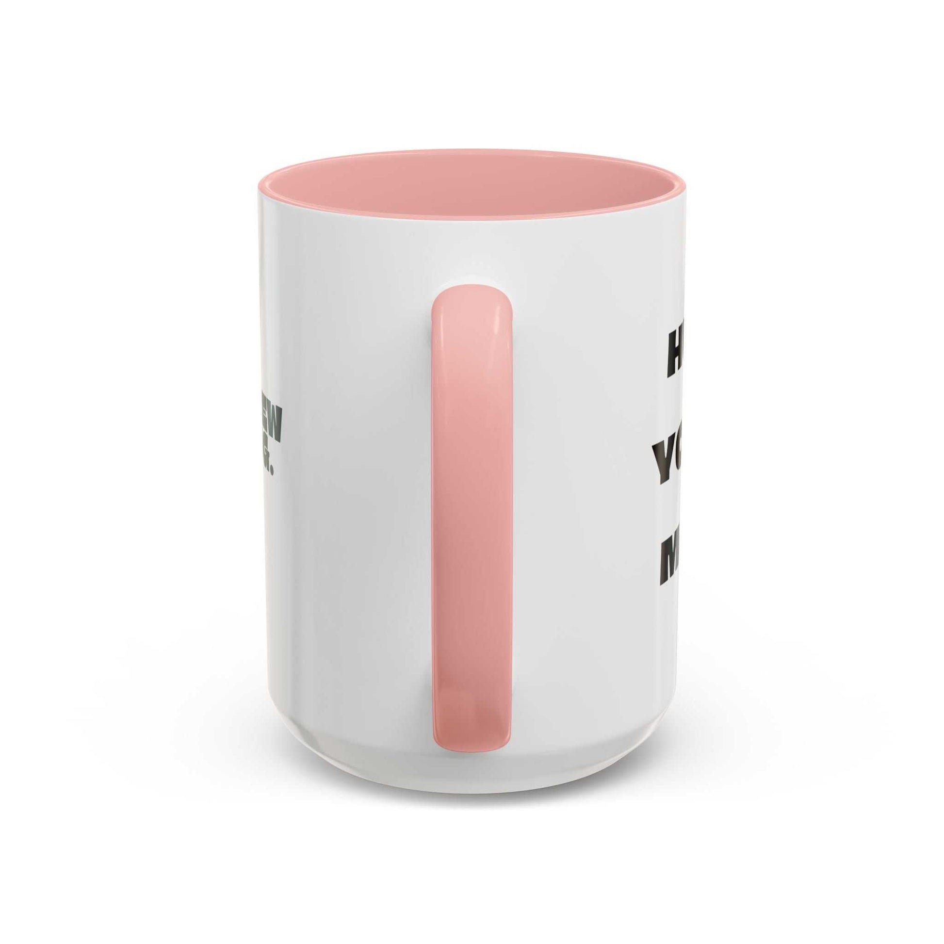 White mug with pink interior and handle on a white background