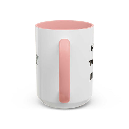 White mug with pink interior and handle on a white background