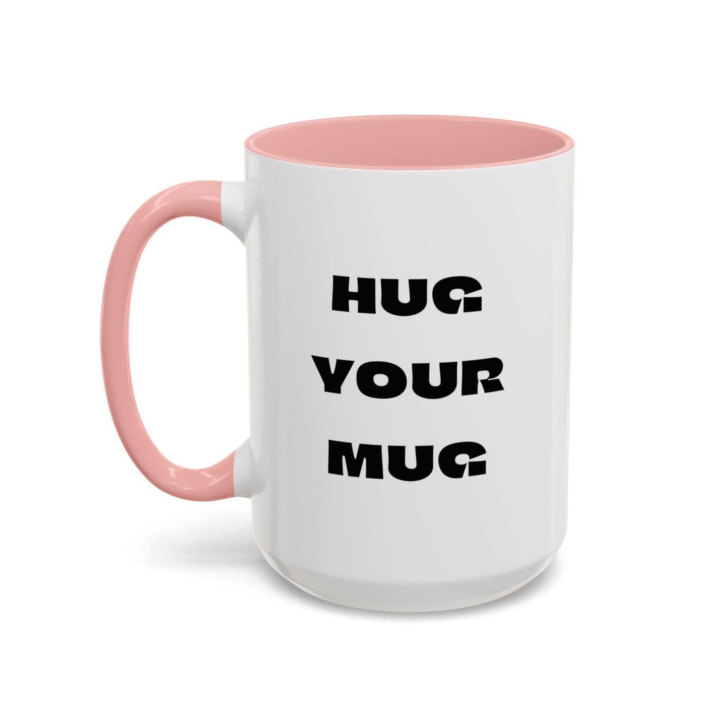 White mug with pink handle and interior, featuring 'HUG YOUR MUG' text.